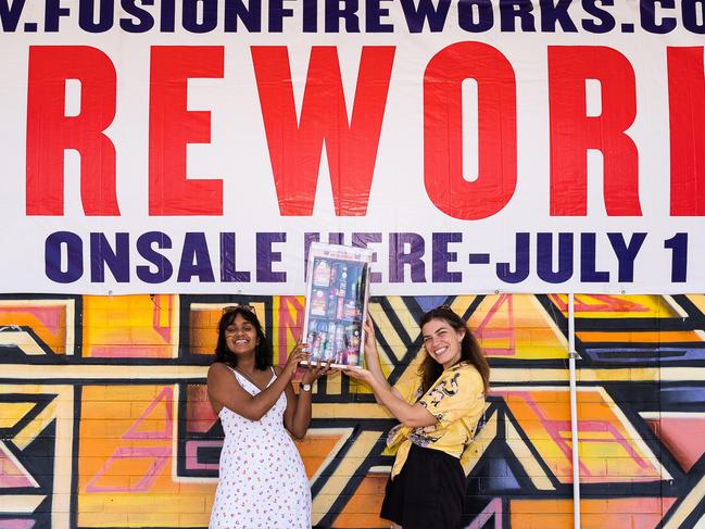 Danu Siba and Leah Rose stocking up with fireworks ahead of an explosive night of fun on Territory Day. Picture: Pema Tamang Pakhrin