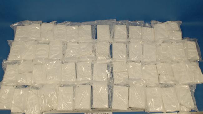 Blocks of cocaine seized - Photo Supplied