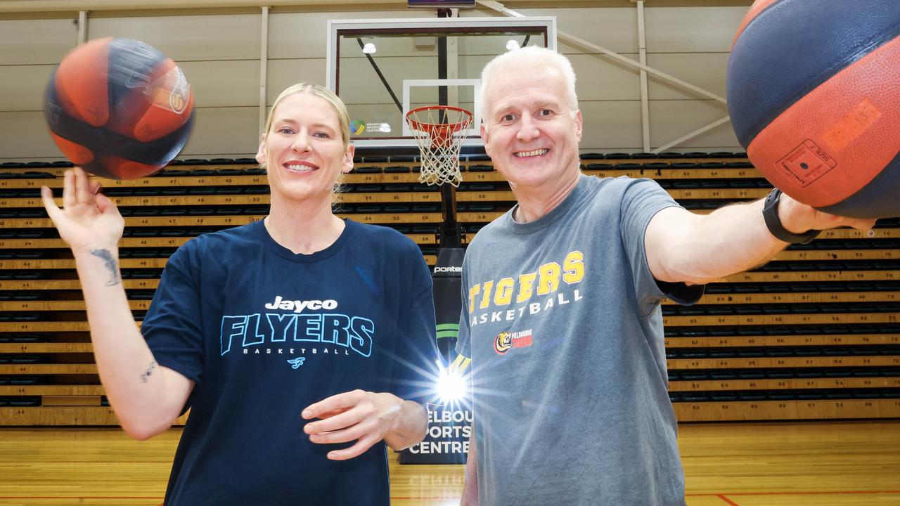 Aussie basketball legends Lauren Jackson and Andrew Gaze pump up Wednesday afternoon’s Flyers game against Bendigo. Picture: Brendan Beckett