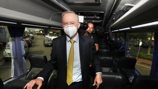 Labor leader Anthony Albanese rides along on the media bus. Picture: Liam Kidston