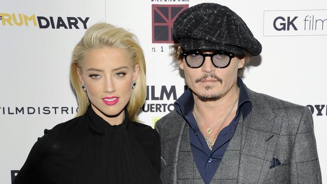 Ms Heard and Mr Depp at the premiere of <i>The Rum Diary</i> at the Museum of Modern Art on October 25, 2011 in New York. Picture: AP Photo/Evan Agostini