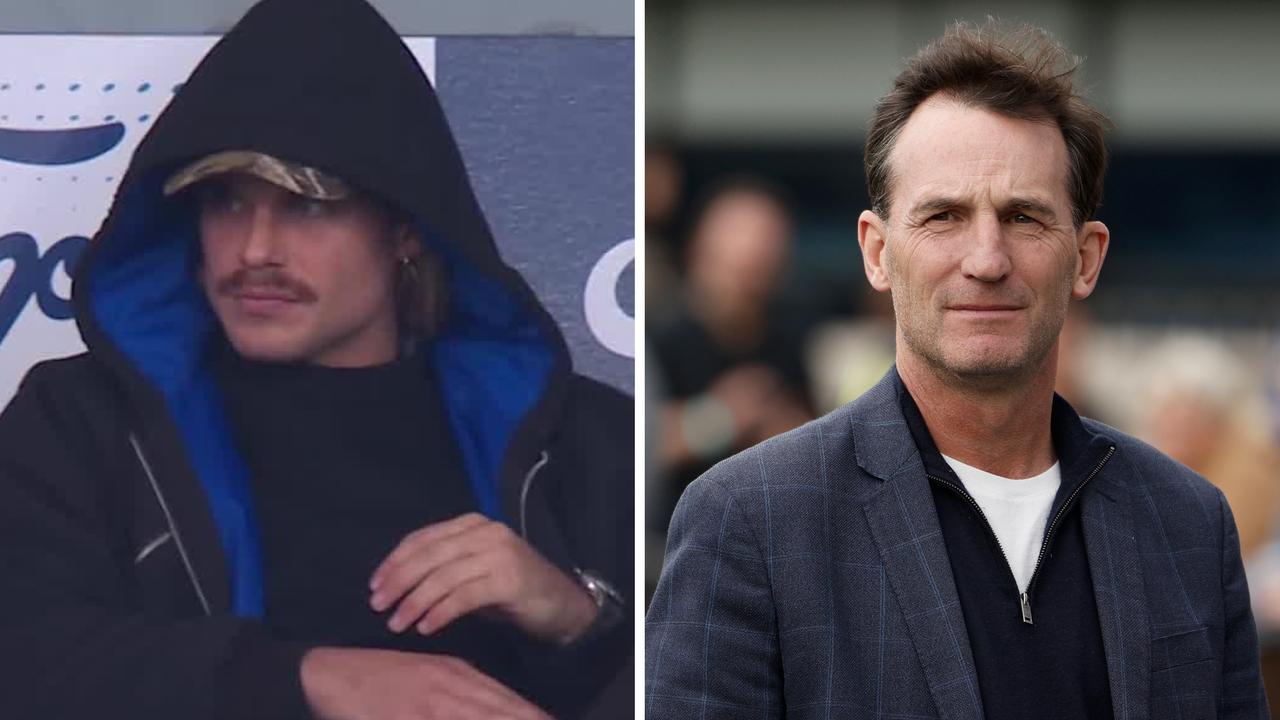 An injured Bailey Smith and AFL chief executive Andrew Dillon.