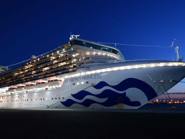 The Diamond Princess cruise ship, with over 3700 people quarantined on-board due to fears of the new coronavirus, is seen anchored at the Daikoku Pier Cruise Terminal in Yokohama port. Picture: AFP