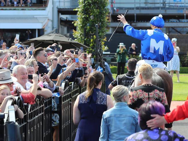 Winx and Hugh Bowman return to scale after winning last year’s Turnbull Stakes.