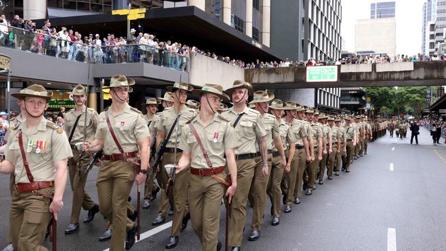 Marching down Adelaide St, during the Anzac Day Parade, Brisbane City. Photo: Steve Pohlner