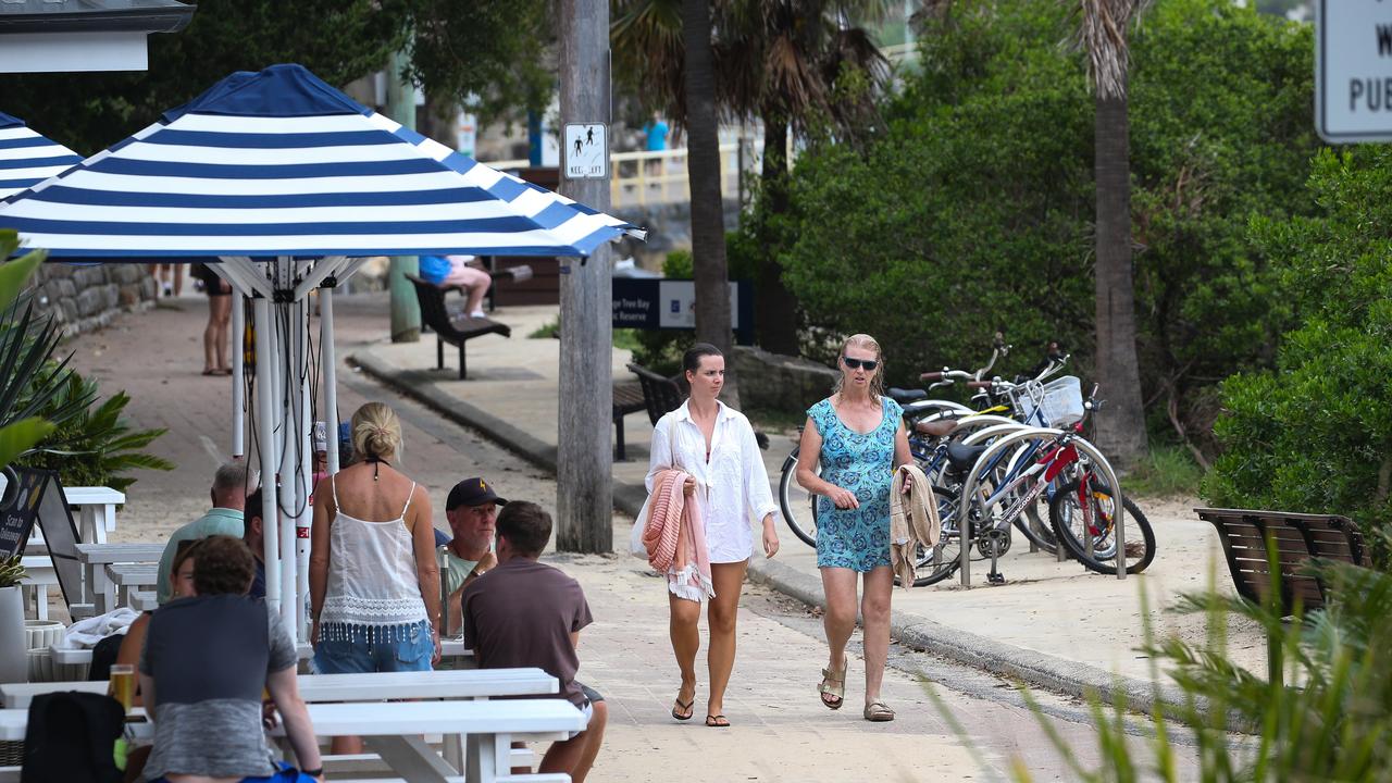 People are seen walking along the public footpath which runs from manly Beach to Shelly Beach. Picture: NCA NewsWire / Gaye Gerard