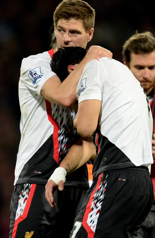 Steven Gerrard and Luis Suarez can’t believe it.