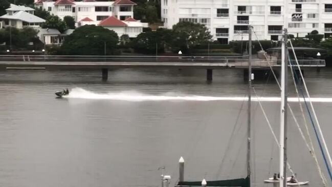 Jetskier rips through Brisbane river on Sunday