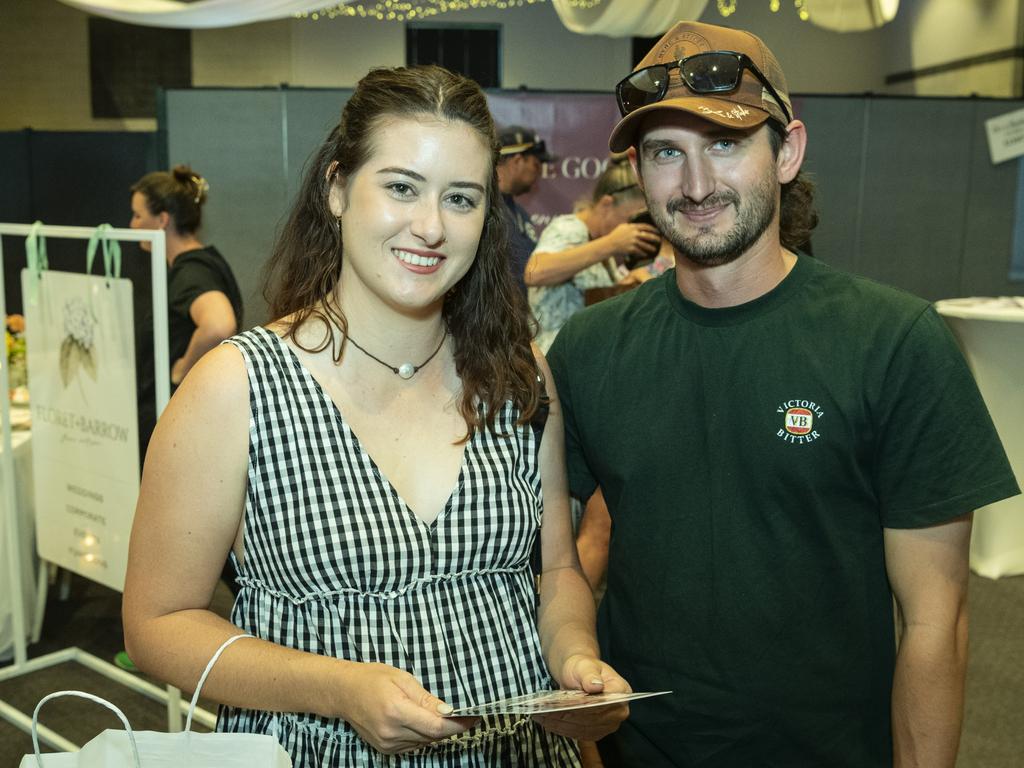 Engaged couple Mikaela Bella and Jordan Smith look at options at Toowoomba's Wedding Expo hosted by Highfields Cultural Centre, Sunday, January 21, 2024. Picture: Kevin Farmer