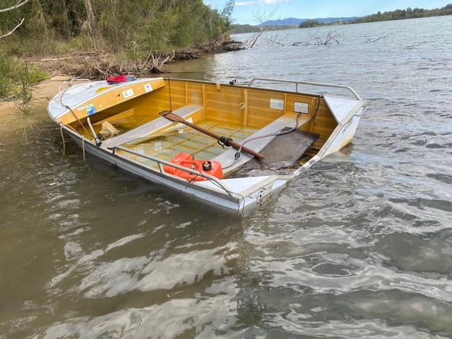 A boat recovered by Nambucca Heads Marine Rescue after it overturned in the river.