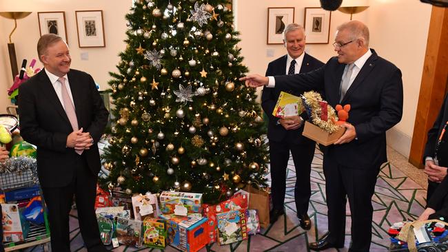 Opposition Leader Anthony Albanese, former deputy PM Michael McCormack and Scott Morrison at the Parliament House Christmas tree in December 2019. Picture: AAP