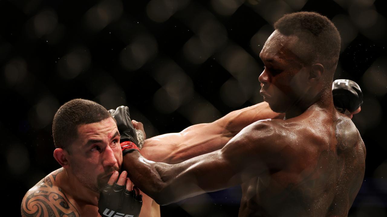 Robert Whittaker versus Israel Adesanyaat UFC 271. (Photo by Carmen Mandato/Getty Images)