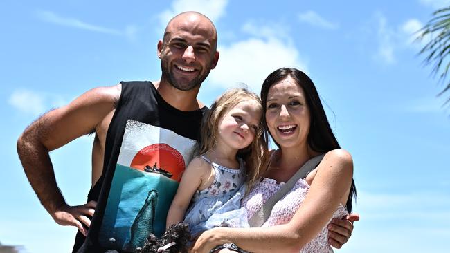 @ThatFalzonFamily – Luke,33, Alexandra, 29, and Ariah – at the Cairns Esplanade on Saturday morning. Picture Emily Barker.