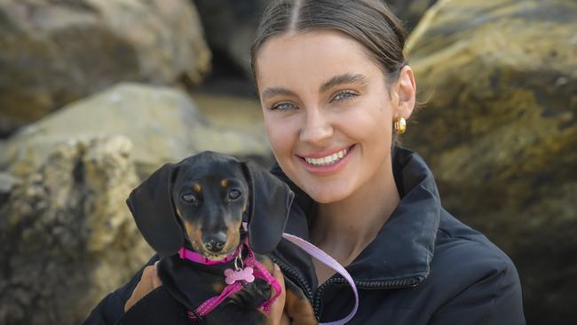 February 14 2025Cutest dog comp launches on Monday. Pic of feature pair, Charlie Hayes and puppy, Lottie at Brighton beach.Picture: RoyVPhotography