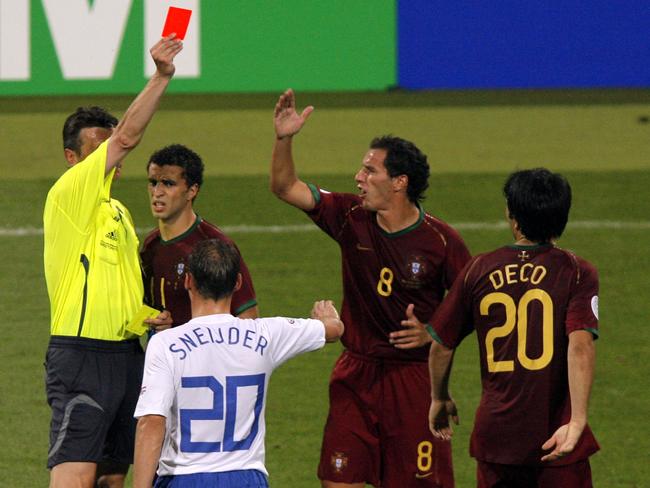 Portugal's Deco is sent off for delaying a free kick.