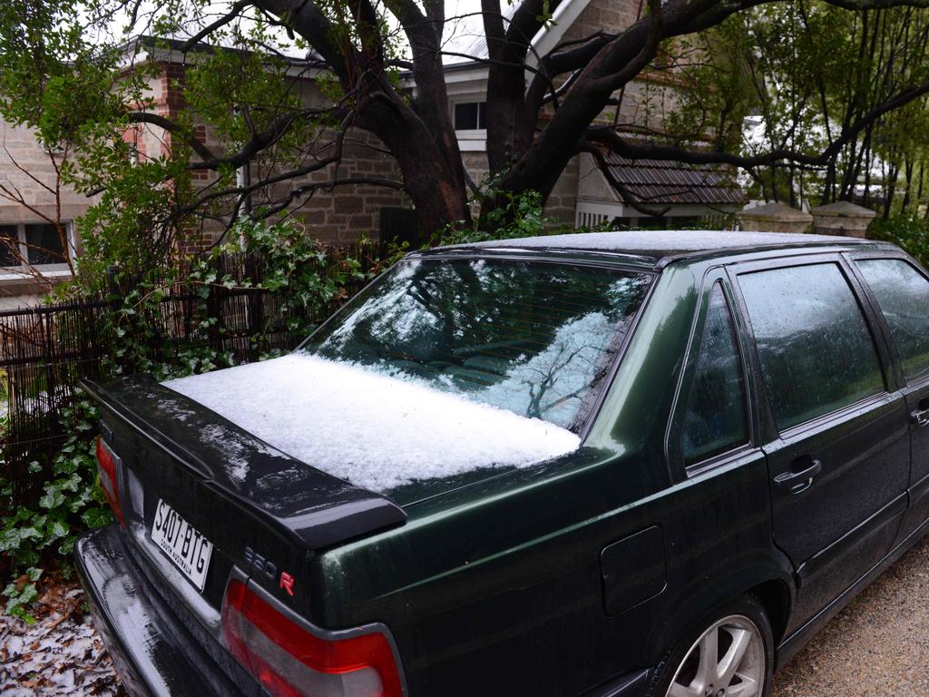 Hail in the Adelaide Hills near Stirling, on Sturt Valley Rd. Picture: AAP/ Brenton Edwards