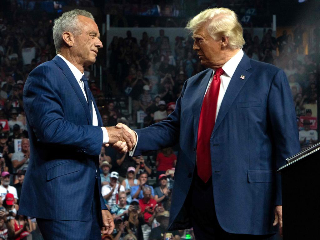 Robert F. Kennedy Jr. and Donald Trump shake hands during a campaign rally. Picture: Rebecca Noble/Getty Images/AFP