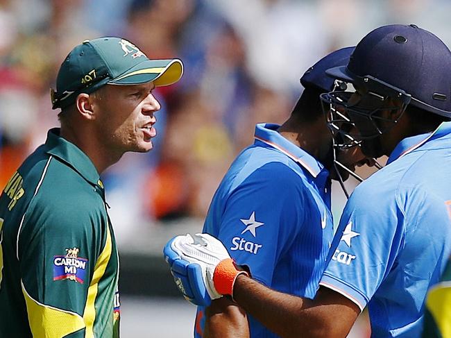 Australia v India Picture:Wayne Ludbey Rohit Sharma & Raina argue with David Warner