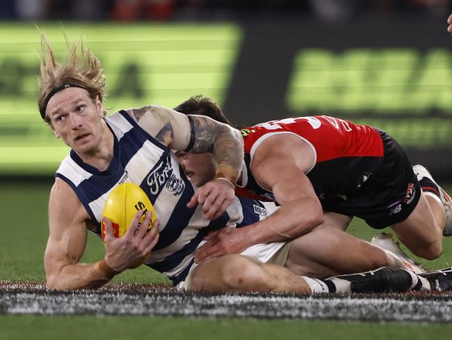 Jack Sinclair catches Cat Tom Stewart. Picture: Darrian Traynor/Getty Images