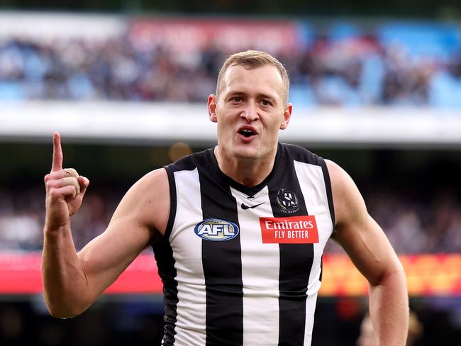 MELBOURNE, AUSTRALIA – JUNE 10: Nathan Kreuger of the Magpies celebrates a goal during the round 13 AFL match between Collingwood Magpies and Melbourne Demons at Melbourne Cricket Ground, on June 10, 2024, in Melbourne, Australia. (Photo by Jonathan DiMaggio/Getty Images)
