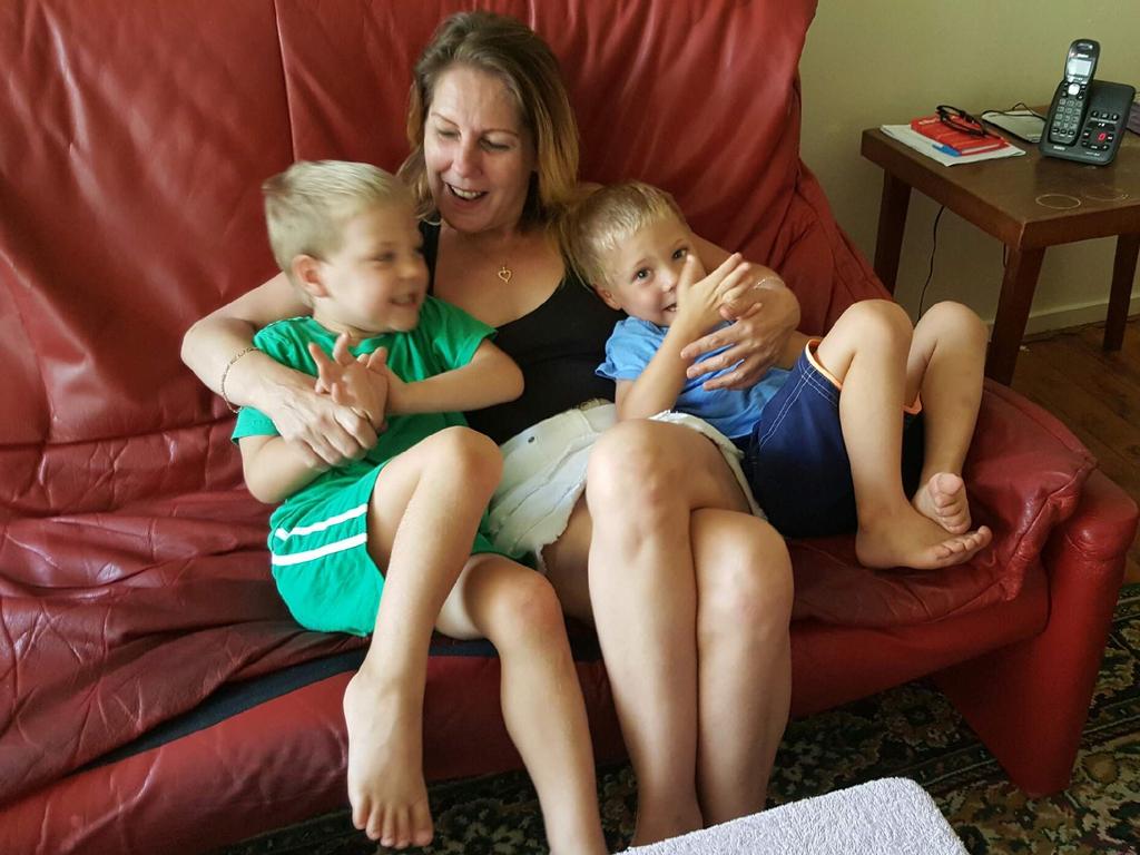 Ms Parkes with two of her grandchildren. Ms Parkes died in hospital on Sunday.
