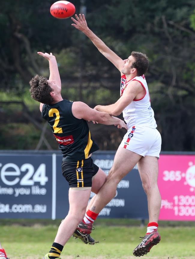 Luke Van Raay wins the tap. Picture: David Trend