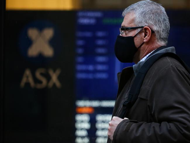 SYDNEY, AUSTRALIA - NewsWire Photos JULY 05, 2021: A member of the public is seen walking past the ASX in the CBD, as we enter week 2 of Covid-19  lockdown in Sydney Australia. Picture: NCA NewsWire / Gaye Gerard