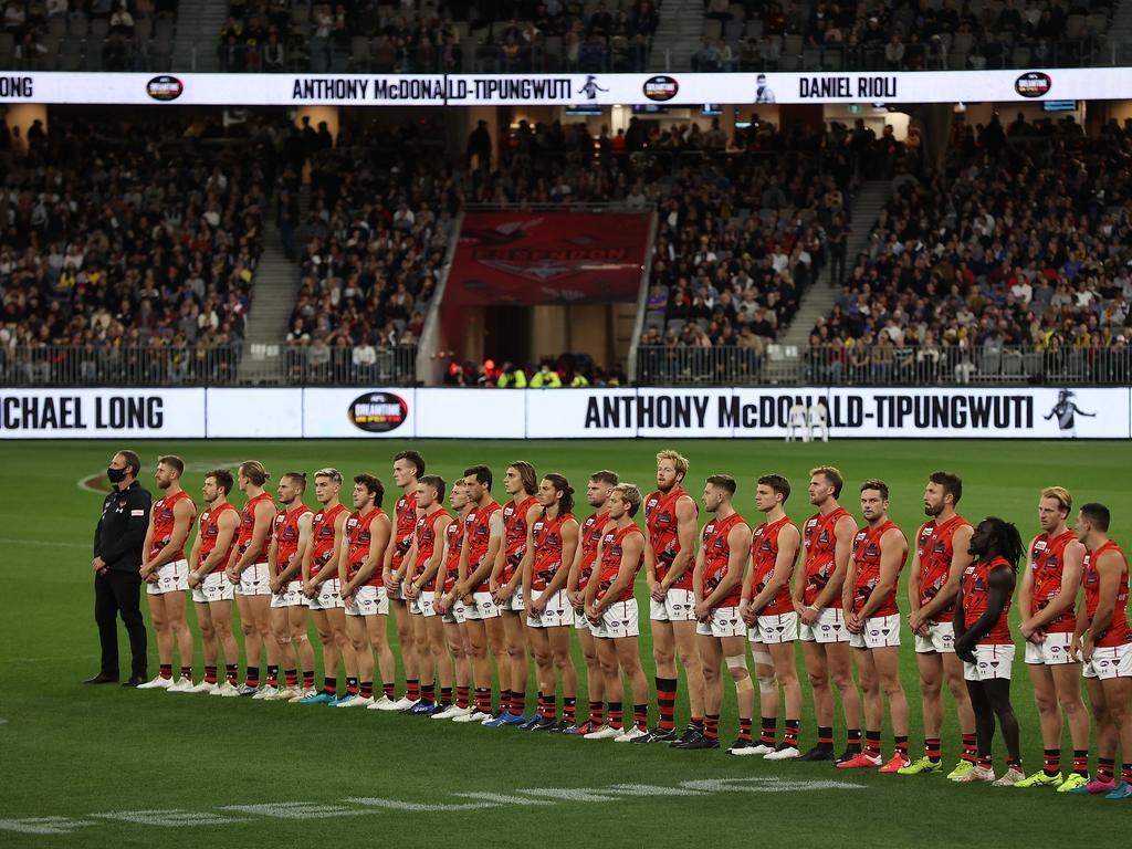 The Bombers line up ahead of the first bounce.