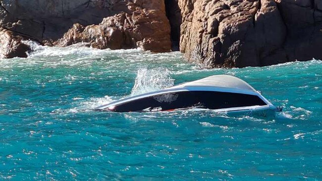 A capsized boat off Eshelby Island in the Whitsundays. Picture: VMR Whitsundays