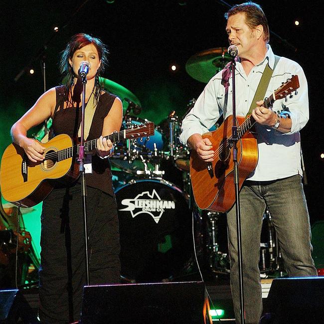 Chamber with her dad Bill Chambers at the Concert For Slim in 2004. Picture: Peter Lorimer