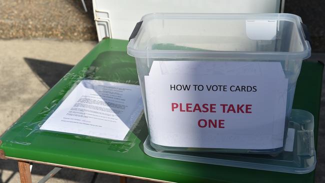 Mayor candidate Chris Thompson has up a box of pamphlets in lieu of volunteers at all Moreton Bay early voting centres. Photo David Alexander