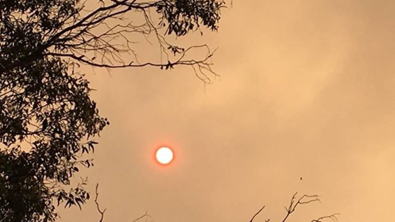 Haze over Kingston from an uncontrolled bushfire raging in the state’s Southwest. Picture: BHAVIT BHATT