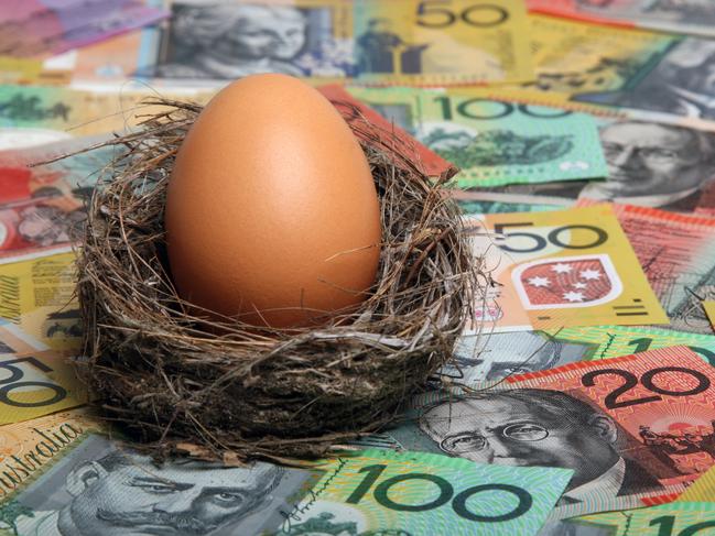 Savings nest egg with Australian dollar notes aa focus on egg. Click to see more...