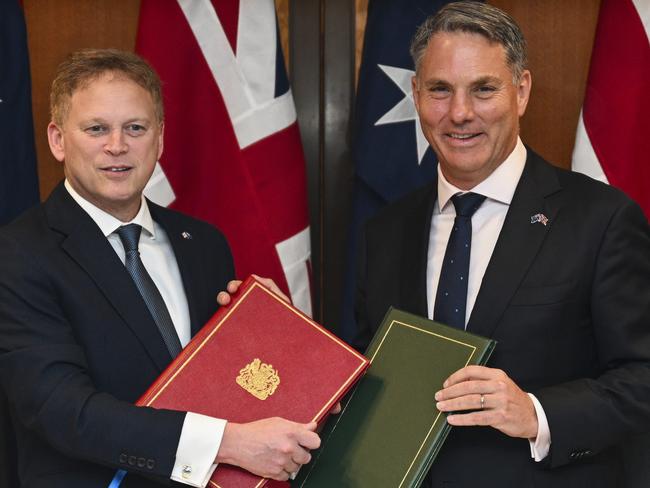 CANBERRA, AUSTRALIA, NewsWire Photos. MARCH 21, 2024: The Deputy Prime Minister, Richard Marles and Secretary of State for Defence of the United Kingdom, the Rt Hon Grant Shapps MP sign a defence treaty at Parliament House in Canberra. Picture: NCA NewsWire / Martin Ollman