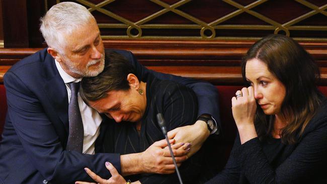 Labor MP Jaala Pulford is comforted by Gavin Jennings after speaking about the death of her daughter. Picture: Michael Dodge/Getty Images