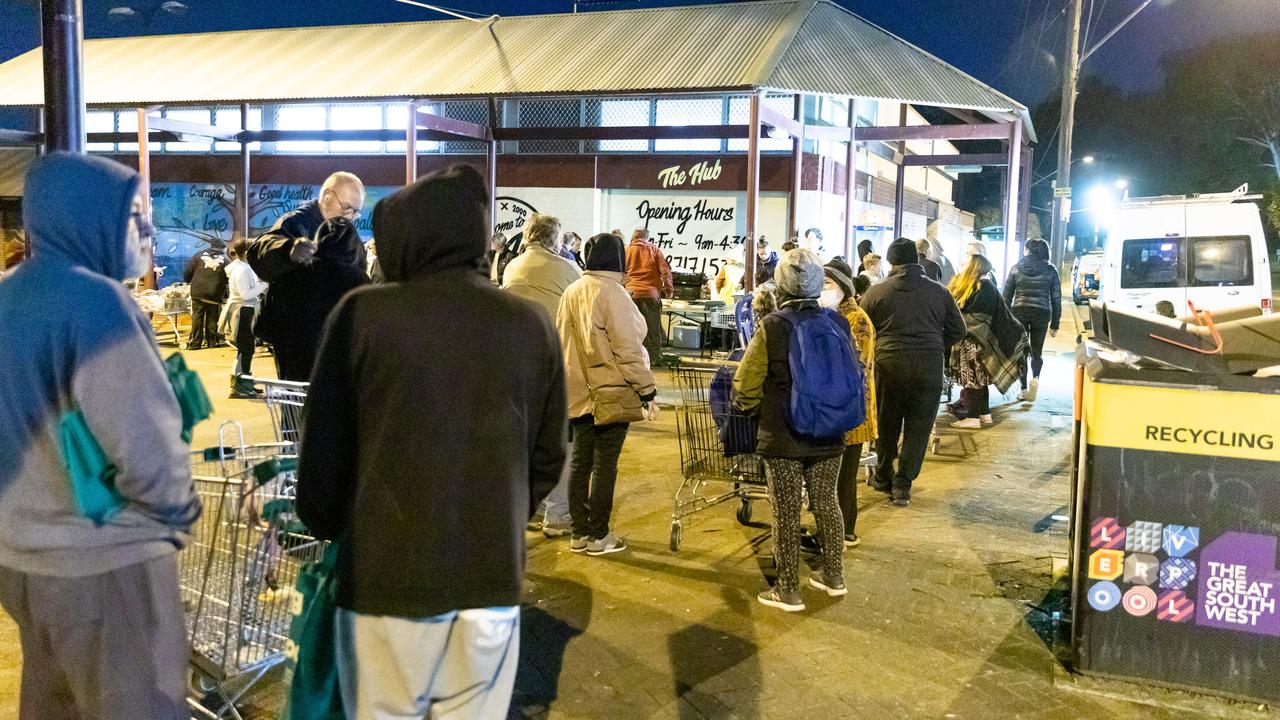 Despite the cold, people had been queuing since 4.30pm. Picture: Media Mode/news.com.au