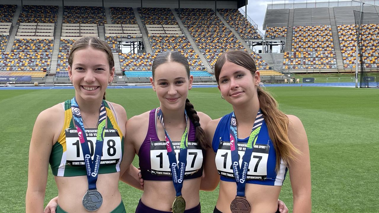 Taya Clayton, middle, broke a record at the Queensland Representative School Sport - she is back again at the nationals.