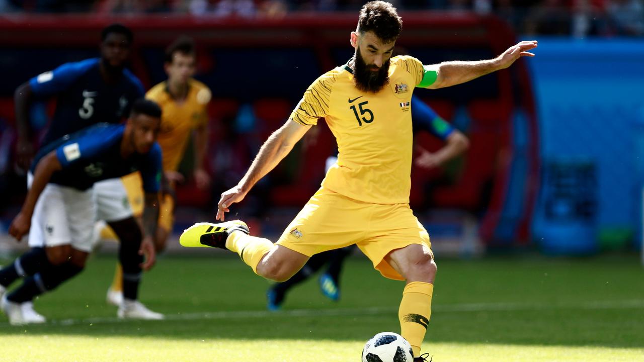 Australia's Mile Jedinak takes a penalty kickto score against France during the Russia 2018 World Cup. AFP PHOTO / BENJAMIN CREMEL