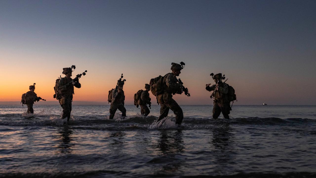 United States Marines from the 1st Battalion, 7th Marines, land on Forrest Beach, Queensland, as part of an amphibious assault activity, during Exercise Talisman Sabre 2021. Picture: Department of Defence