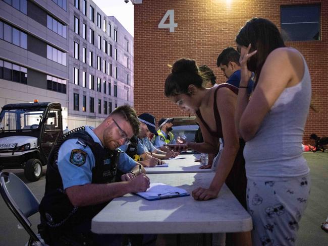 Evacuees spent Christmas night inside of the exhibition hall at the Sydney Showground. Picture: Flavio Brancaleone