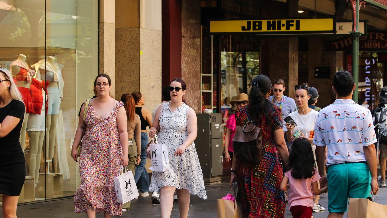 Few shoppers chose to wear masks at Sydney’s busy Pitt Street Mall this week, as Australians enjoy a summer free of restrictions. Picture: NCA Newswire / Gaye Gerard