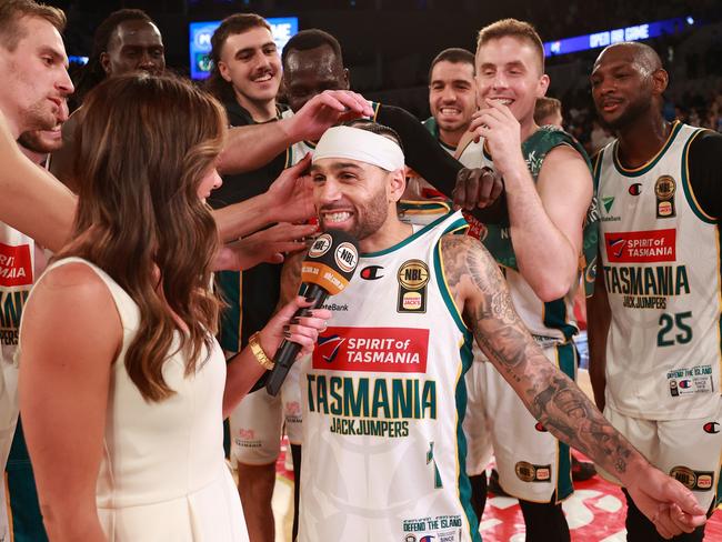 Jordon Crawford of the JackJumpers celebrates Monday’s win in Melbourne with teammates. (Photo by Kelly Defina/Getty Images) *** BESTPIX ***