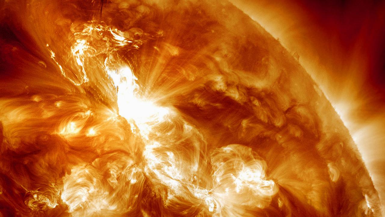 Another solar flare erupting on the Sun, this one in 2012. The radiation from this solar flare arrived at Earth an hour later. Picture: AP/NASA