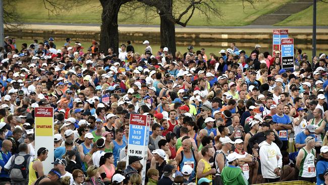 Athletes line up before the start of a Melbourne Marathon. Picture: Andy Brownbill