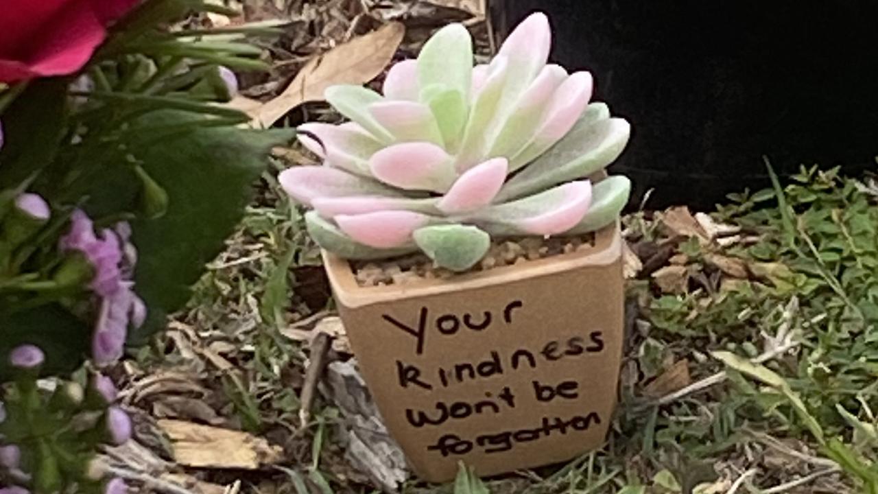 Flower tributes at the scene of a crash in Burnside, which killed 52-year-old aged care worker Stella Tan. Picture: Elizabeth Neil