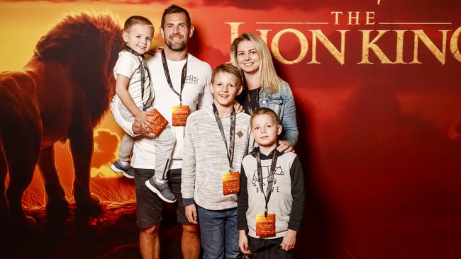 Luke Hodge with wife Lauren and sons Chase, Leo and Cooper at the Queensland Preview Screening of Disney’s The Lion King.