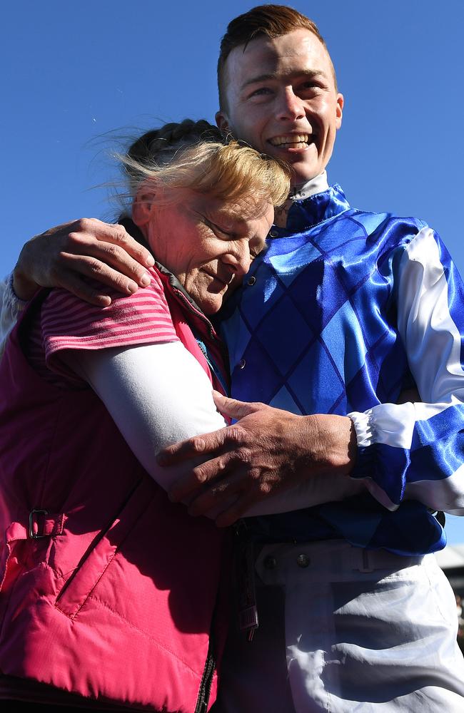 Trainer Udyta Clarke and jockey Patrick Moloney embrace after Rich Charm won on Derby Day last year. Picture: AAP