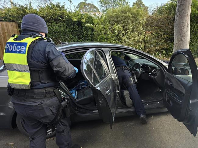 Police search Damian Newton’s stolen Commodore. Picture: Supplied