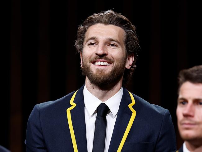 MELBOURNE, AUSTRALIA - AUGUST 29: Dan Houston of the Port Adelaide Power, Marcus Bontempelli of the Western Bulldogs and Dayne Zorko of the Brisbane Lionsis are seen after being named in the All Australian team during the 2024 AFL Awards at Centrepiece on August 29, 2024 in Melbourne, Australia. (Photo by Michael Willson/AFL Photos via Getty Images)