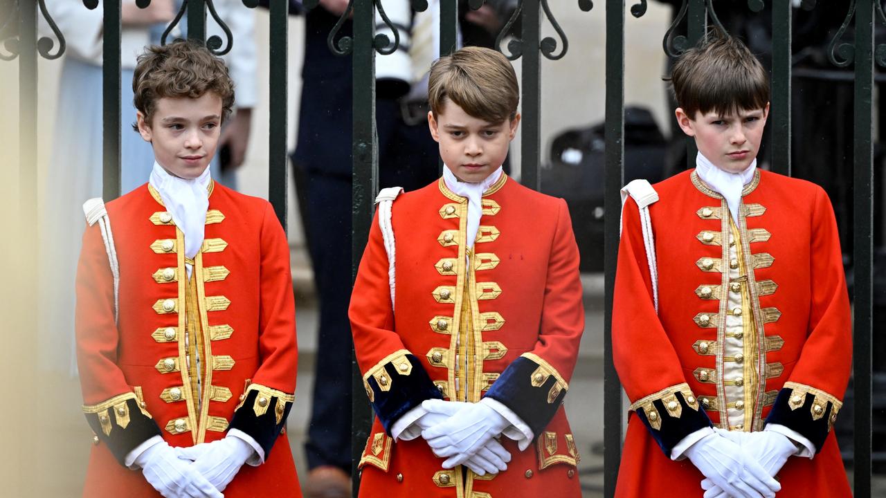 Prince George (centre) stands at the coronation of his grandfather. Picture: Toby Melville / WPA Pool/Getty Images